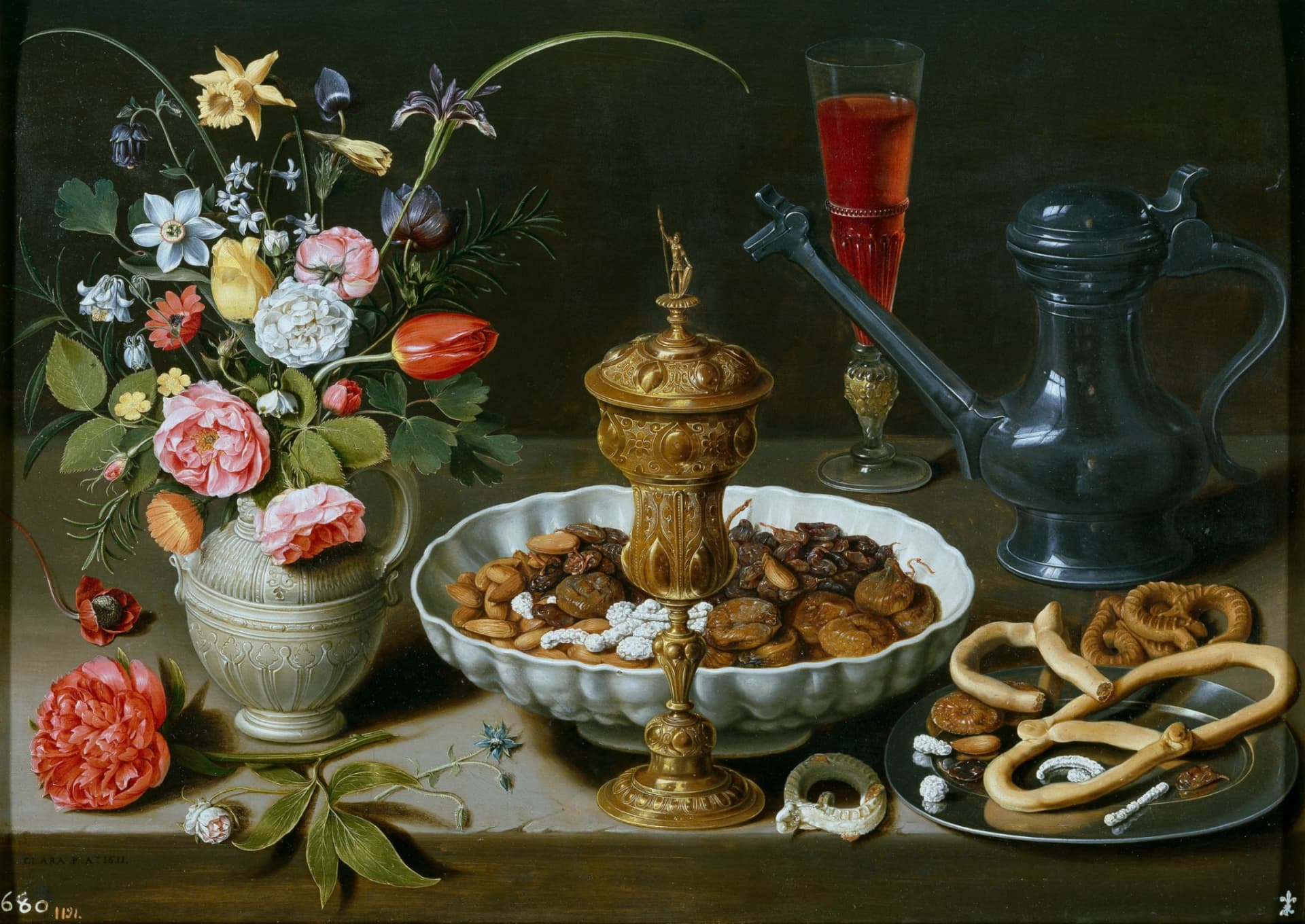 Clara Peeters, Natura morta con fiori, calice e prelibatezze, 1611, olio su tavola, 52 x 73 cm, Museo del Prado, Madrid.