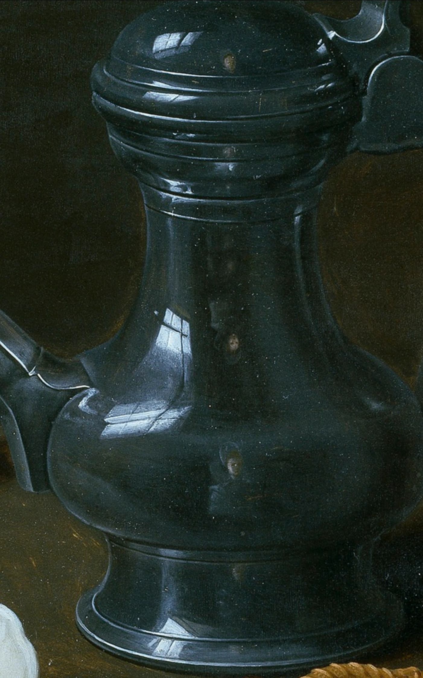 Clara Peeters, Natura morta con fiori, calice e prelibatezze, 1611, olio su tavola, 52 x 73 cm, Museo del Prado, Madrid. Dettaglio del riflesso con autoritratto.