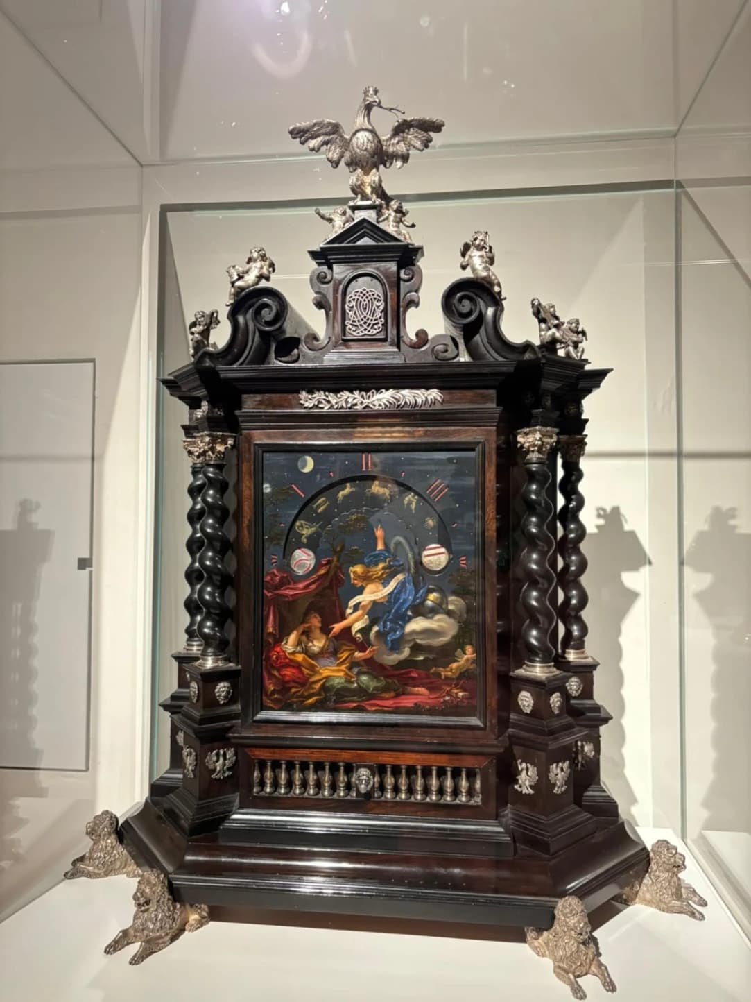 Paolo Gerolamo Piola, Orologio notturno raffigurante Diana (o l'Allegoria della Notte?), fine del XVII secolo - inizi del XVIII secolo, cassa in legno intagliato e tinto color ebano, argento sblazato e cesellato, mostra in rame dipinto a olio, collezione privata.